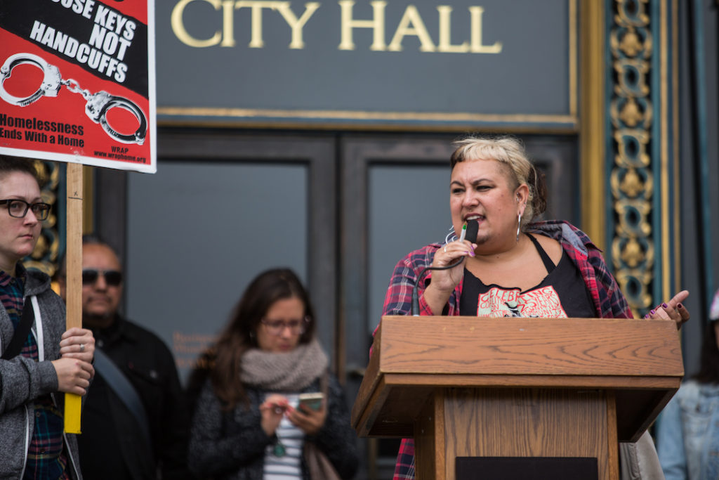 Lisa Marie Alatorre of the Coalition On Homelessness spoke on the steps of San Francisco City Hall before a rally against two proposed ballot measures. Photo: Khaled Sayed
